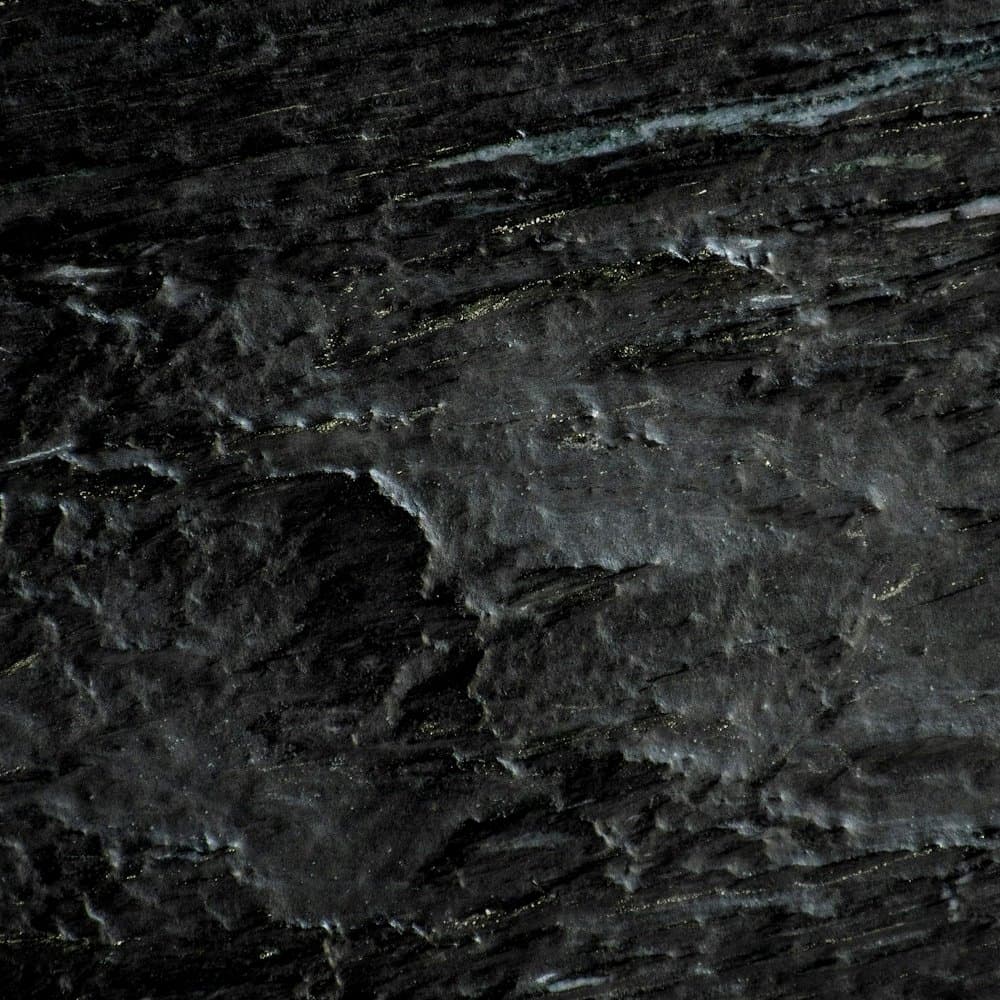 Leathered black granite swatch with a soft matt texture