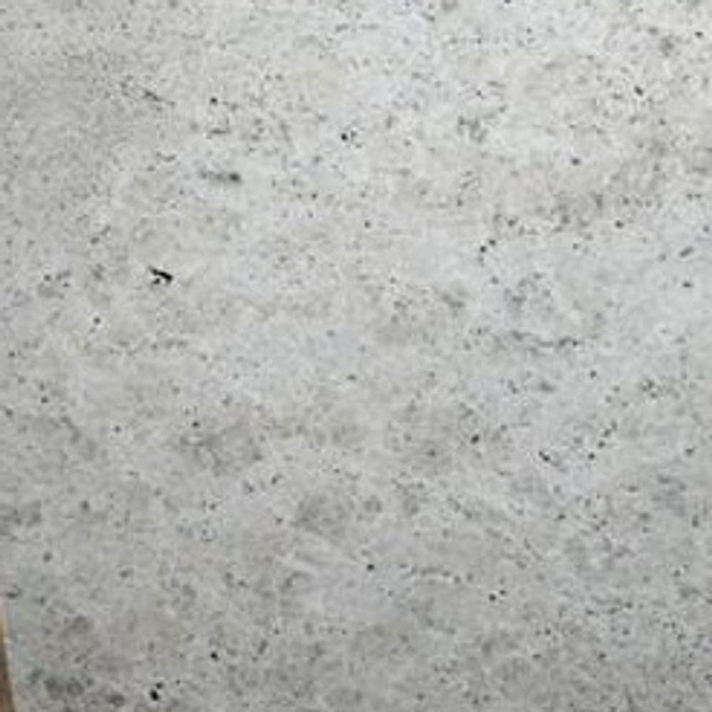 Colonial White granite worktop surface, close up